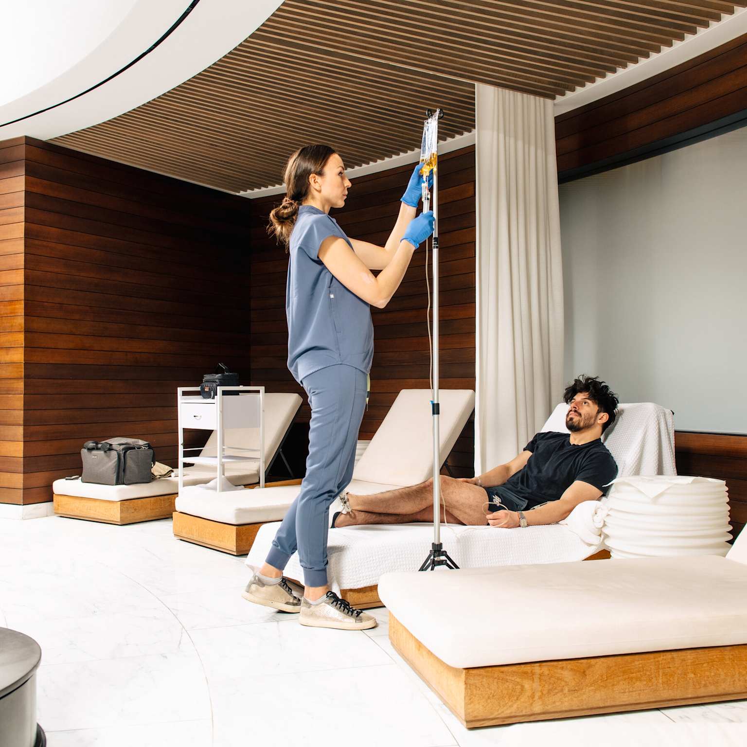 Concierge IV therapy in luxury hotel suite